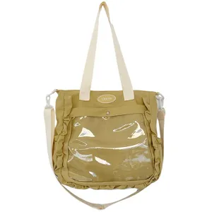 Detailed view of the clear front window and sturdy handles on the Japanese ita bag.