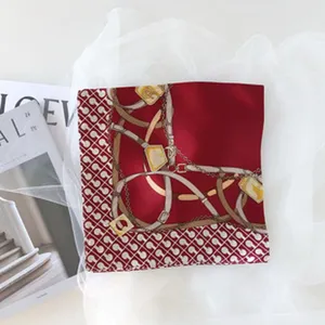 Women's luxury silk square scarf with elegant chain and lock print design for spring and autumn.