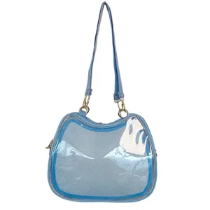 Detail view of the blue transparent ita bag featuring clear PVC window and cute cat design.