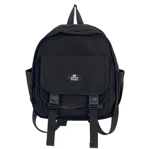Black mini ita backpack with clear window and front straps, detailed view of cute design.