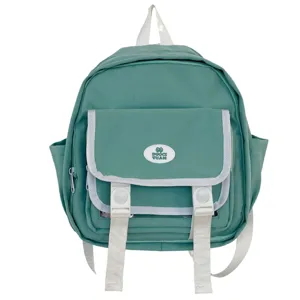 Mini JK style backpack detail view featuring cute badge patch and white straps for daily use.