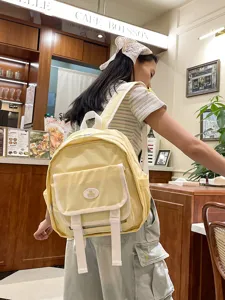 Cute yellow mini backpack Japanese JK uniform school bag casual everyday shoulder daypack.