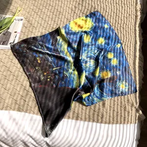 Detailed view of starry night silk square scarf showing fine texture and exquisite printing.