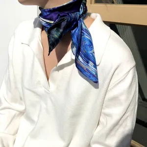 Exquisite starry night pattern silk scarf detail, elegant neck accessory for women.