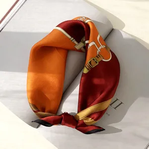 Luxury style silk scarf for women featuring elegant belt and chain print design fashion.