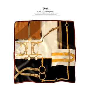 Luxury silk scarf featuring elegant equestrian belt and horse bit design for women.