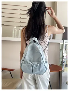 Lichtblauwe nylon rugzak voor dames schattige strik schooltas casual lichte dagrugzak