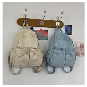 Nylon rugzak lichte zoete strik schooltas detailweergave met mooi en schattig ontwerp.