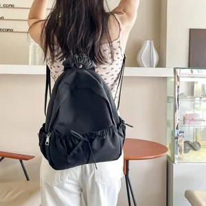 Stijlvolle zwarte nylon rugzak voor dames, casual dagelijkse schooltas met strikkoord.