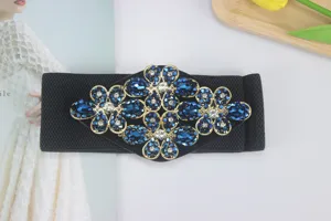 Wide elastic waist belt for women with gorgeous blue crystal floral rhinestone buckle.