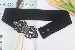 Close-up of the elegant black elastic wide waist belt with sparkling crystal rhinestone buckle.