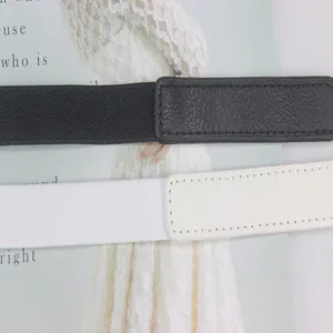 Minimalist elastic waist belt set in black and white with chic PU leather buckle detail.
