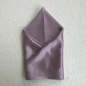 Luxurious mulberry silk square scarf in elegant mauve, smooth texture for autumn style.
