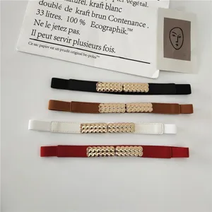 Women elastic waist belt with gold metal interlocking buckle, retro thin dress waistband.