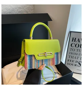 Stylish spliced shoulder bag with colorful woven body and lime green flap for women.