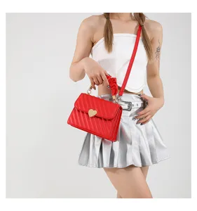 Red quilted crossbody bag with heart clasp and shoulder strap for women fashion summer