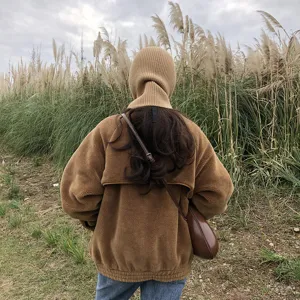 Brown knitted balaclava winter hat with fleece jacket outdoor cozy women fashion streetwear warm style