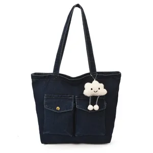 Casual denim tote bag for women with large capacity, dual front pockets and cute cloud charm.