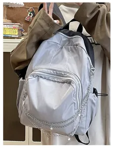 Casual grey and black backpack with chain and star pendants for daily student commute use.