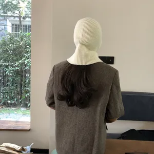 Cozy knit balaclava winter hat with neck warmer, stylish cream color pullover headwear for women.