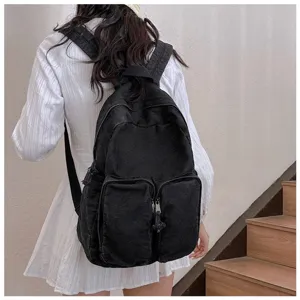 Vintage minimalist black denim backpack for casual daily use and student school wear today.