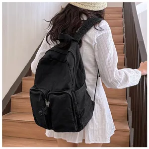 Casual black denim backpack for students, vintage Japanese style daily campus bag.