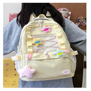 Zaino in stile coreano multi-tasche con coulisse e ciondoli a stella in peluche per la scuola e lavoro.