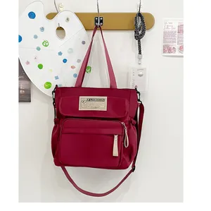 Bolso de lona rojo oscuro para estudiantes, bolso cruzado informal para la escuela.