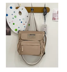 Bolso bandolera de lona para estudiantes, bolso casual con múltiples bolsillos caqui.