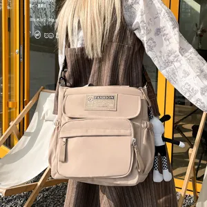 Bolso bandolera informal de lona para estudiantes, bolsa caqui con múltiples bolsillos.
