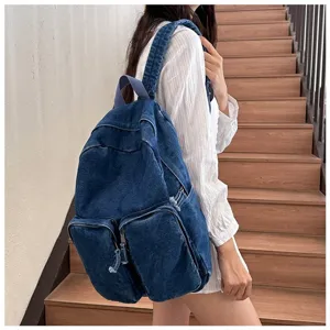 Vintage blue denim backpack for men, casual Japanese style school bag with multiple pockets.