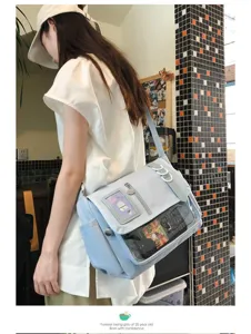 Detail shot of cute Japanese ins style ita bag with transparent window for pins and badges.