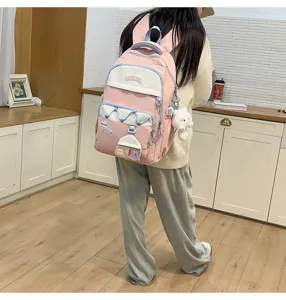 Mochila escolar rosa bonita para niñas con gran capacidad y múltiples bolsillos.