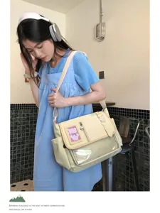 Japanese style sweet canvas messenger ita bag with transparent window for daily student use.