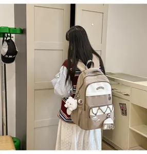 Mochila escolar de gran capacidad para estudiantes, elegante diseño con oso lindo.