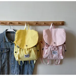 Japanese style casual canvas backpack, minimalist design with dual colors for daily commuting.
