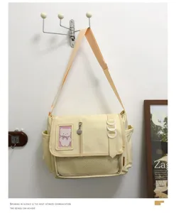 Cute canvas messenger bag for teens, transparent window ita bag for pins and badges.