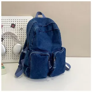 Classic vintage denim casual backpack for men and students, stylish daily school bookbag.
