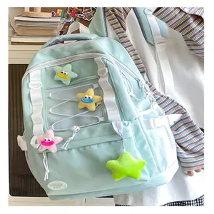 Zaino casual multitasche stile coreano con coulisse e simpatici ciondoli stella in peluche.