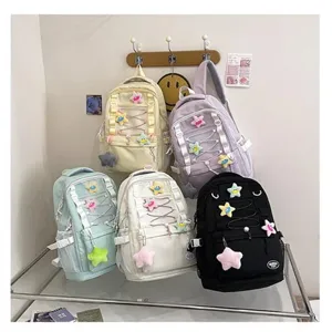 Zaino scolastico casual multi-tasche in tela con ciondolo a stella in peluche per studenti quotidiani