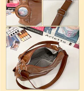 Large capacity PU leather shoulder bag with transparent baji pocket and adjustable strap for daily use.