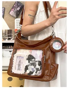 Brown PU leather ita bag with clear transparent front pocket, large capacity casual tote.