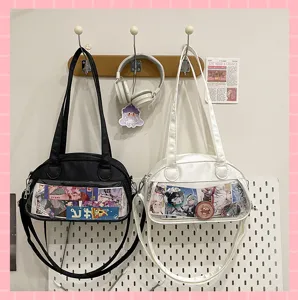 Clear front pocket shoulder crossbody ita bag for anime badges, black and white stylish.