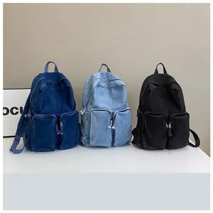 Casual vintage denim backpack for students, multi-pocket school bag daily daypack.