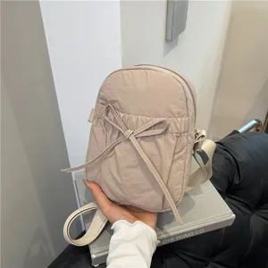 Japanese minimalist waterproof nylon crossbody bag with bow, casual portable phone bag for women