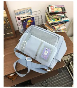 Japanese ins cute student messenger ita bag with transparent window for pins and daily wear.