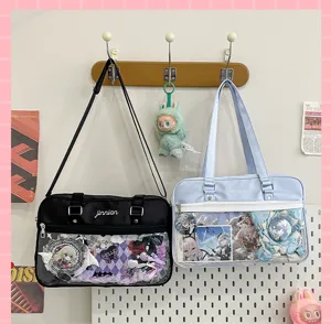 Detailed view of Japanese JK uniform ita bags featuring clear front pockets for anime badges.