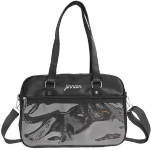 Details of the black JK uniform ita bag, featuring a transparent front pocket and shoulder strap.