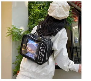 Transparent window ita bag, black PU leather backpack and crossbody for dolls and fans.