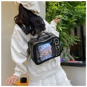 Detailed view of black PU transparent ita bag with cute plush doll for daily use now.